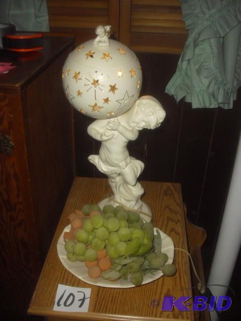 Ball on shoulders of child.. Fruit plate LAMP...