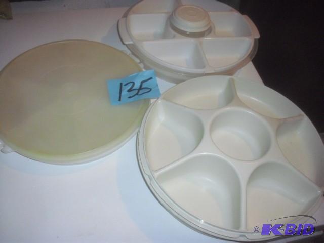 3 Sectioned plastic trays.. All have covers...