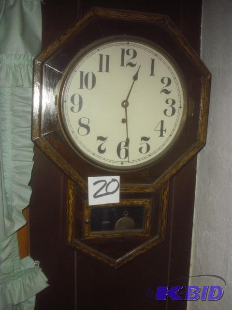 Pendulum clock.. No maker shown. 25 in h x 17...
