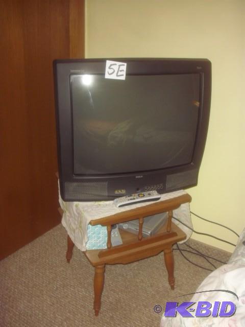 24 in RCA TV and 24 x 24 in end table....