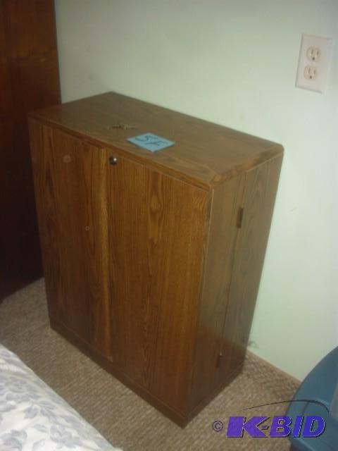 Simulated wood cabinet. Locks and have keys.....