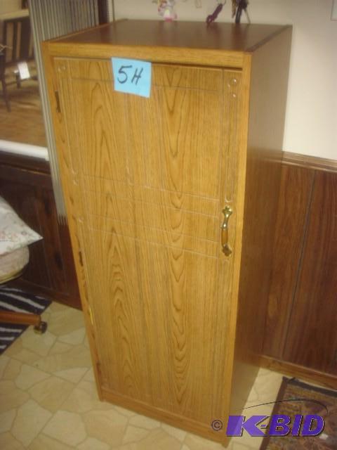 Simulated wood Cabinet. Some veneer off on on...