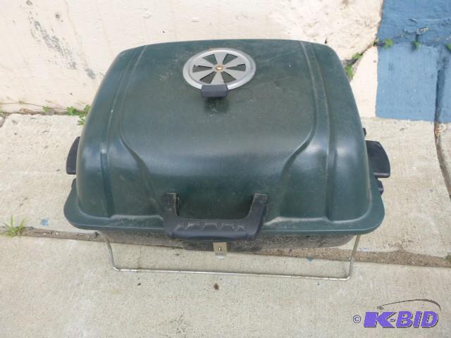 lot 120 image: Portable Charcoal Grill...