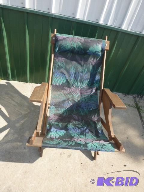 lot 162 image: Rocking Fold-Up Patio Chair...