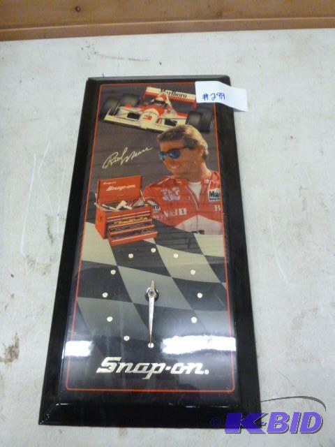 lot 289 image: Rick Mears Snap-On Wall Clock 23" X 11&q...