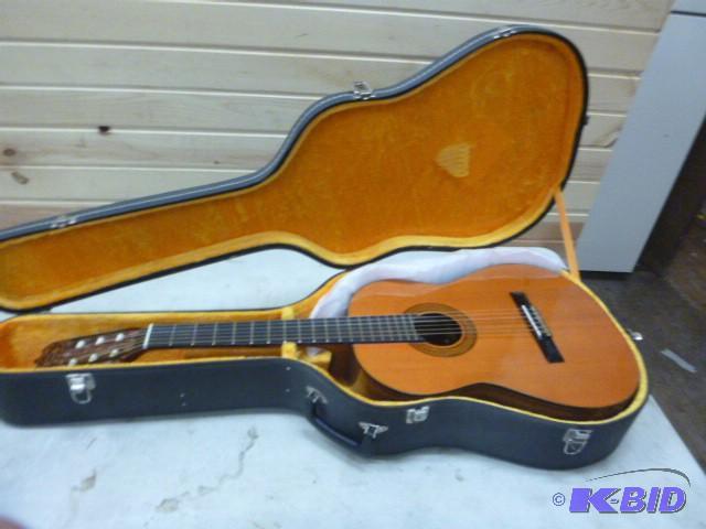 lot 51 image: LaPrimera Acoustic Guitar with Case Model D34...