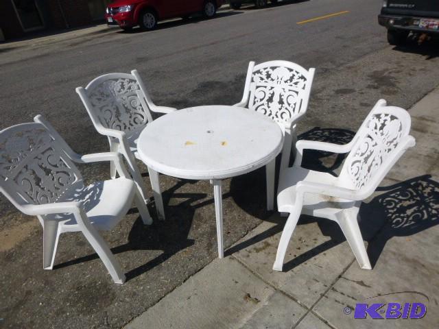 lot 93 image: Outdoor Table with 4 Resin Chairs...