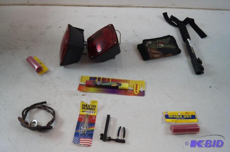 2 trailer lights, bow rest, broke shooting sticks and more