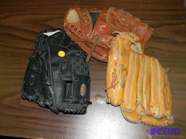 lot 169 image: Lot of 3 baseball gloves - two left and one r...
