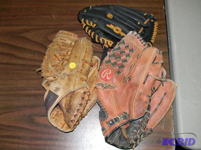 lot 170 image: Lot of 3 - two left handed baseball gloves an...