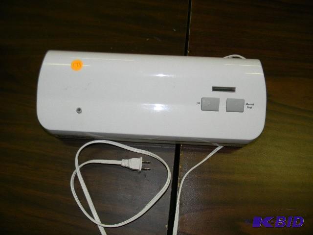 lot 173 image: Food Saver Deluxe vacuum sealer...