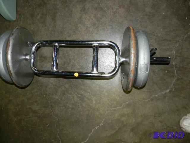 lot 188 image: Tricep bar with two 25lb. and two 14.3lb. wei...