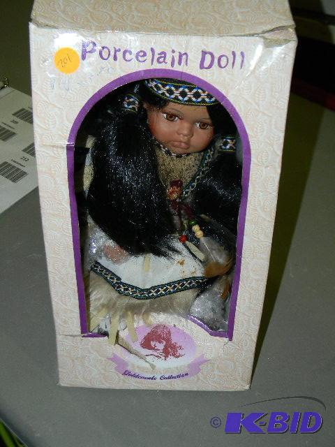 lot 201 image: American Indian porcelain doll...