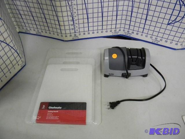 lot 21 image: Smith knife sharpener and 3 NEW cutting board...