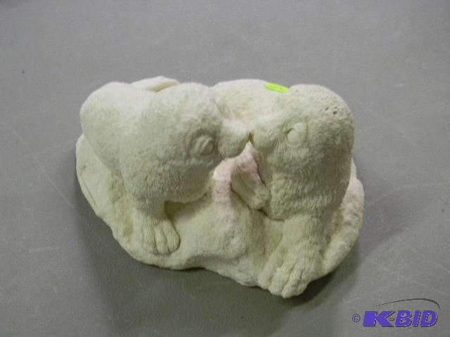 lot 214 image: Ceramic seal statue...