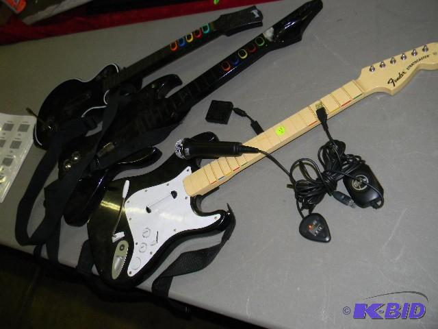 lot 224 image: Lot of Guitar Hero and Rock Band guitars and ...