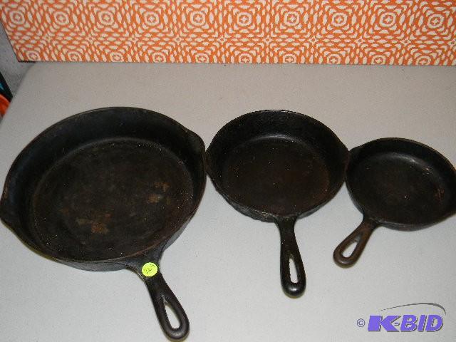 lot 269 image: Lot of three cast iron frying pans...