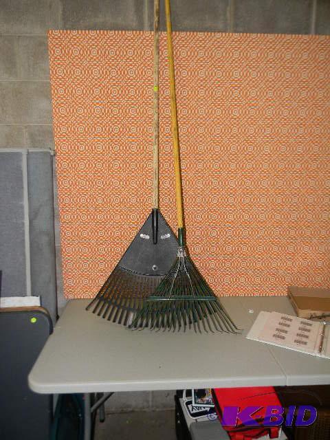lot 276 image: Lot of 2 rakes - one plastic and one metal...