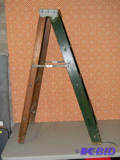 lot 281 image: Four foot ladder...