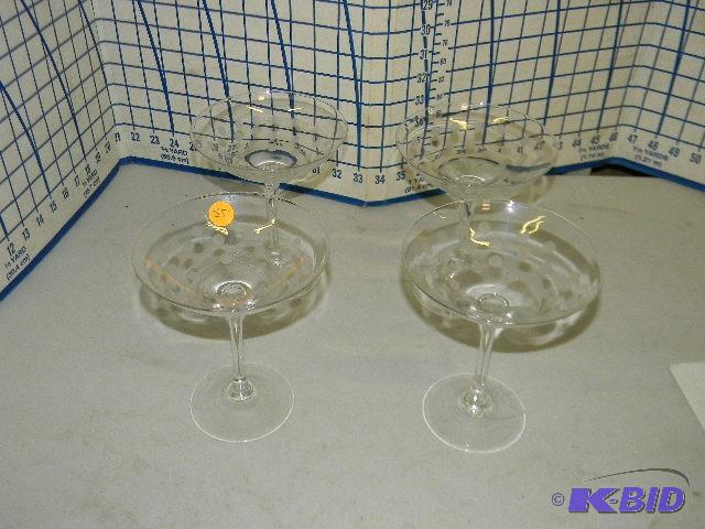 lot 35 image: Four dotted martini glasses...
