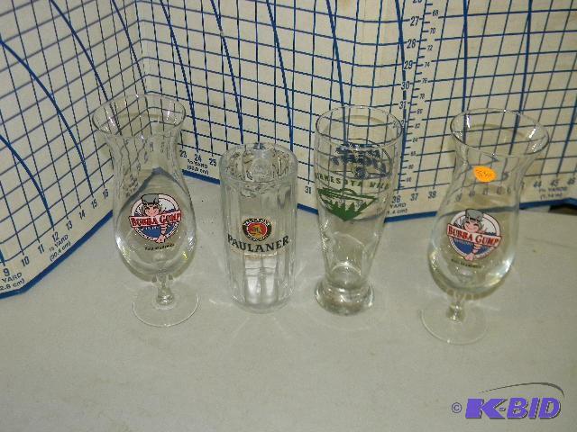 lot 36 image: Four drink glasses - two beer glasses and two...