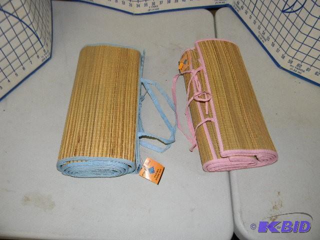 lot 77 image: Two straw mats for sunbathing and more One p...