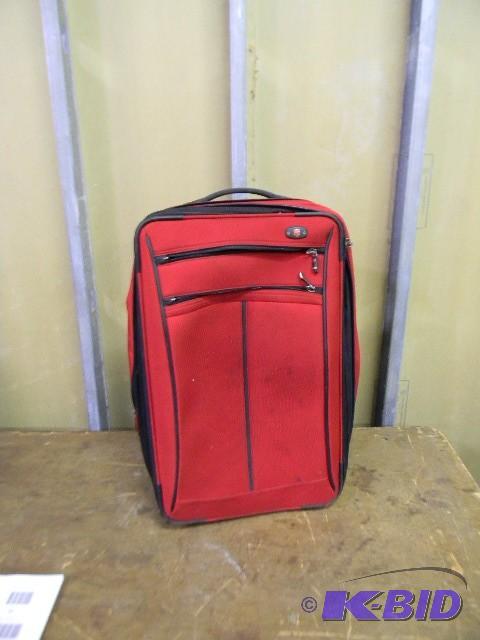 lot 98 image: Red Swiss rolling luggage...