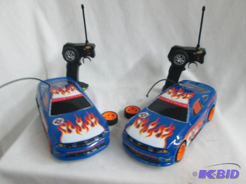 lot 47 image: Two - Urban RideZ Remote Controlled 116 Mustang GT