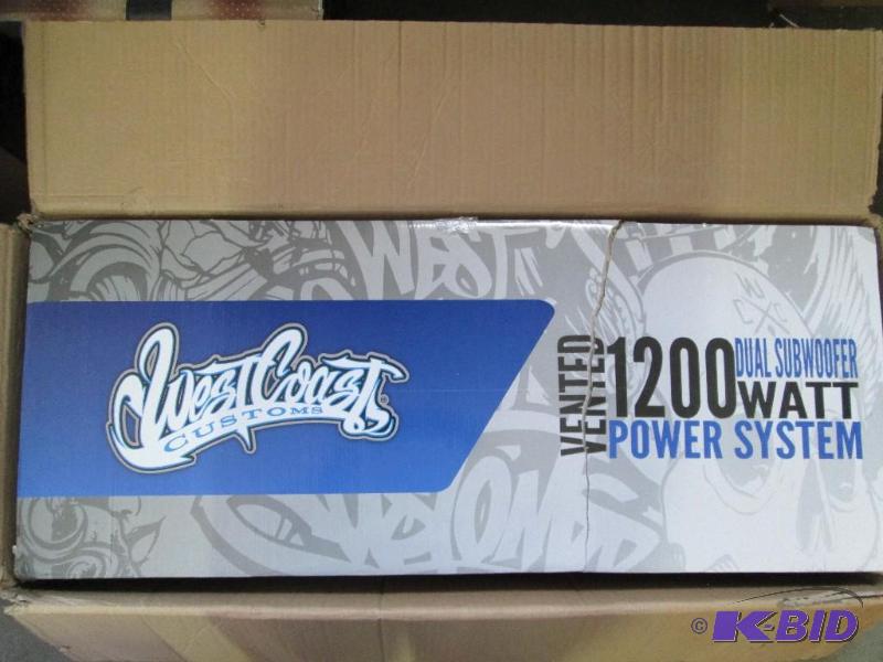 lot 13 image: West Coast 1200 watt dual subwoofer power sys...