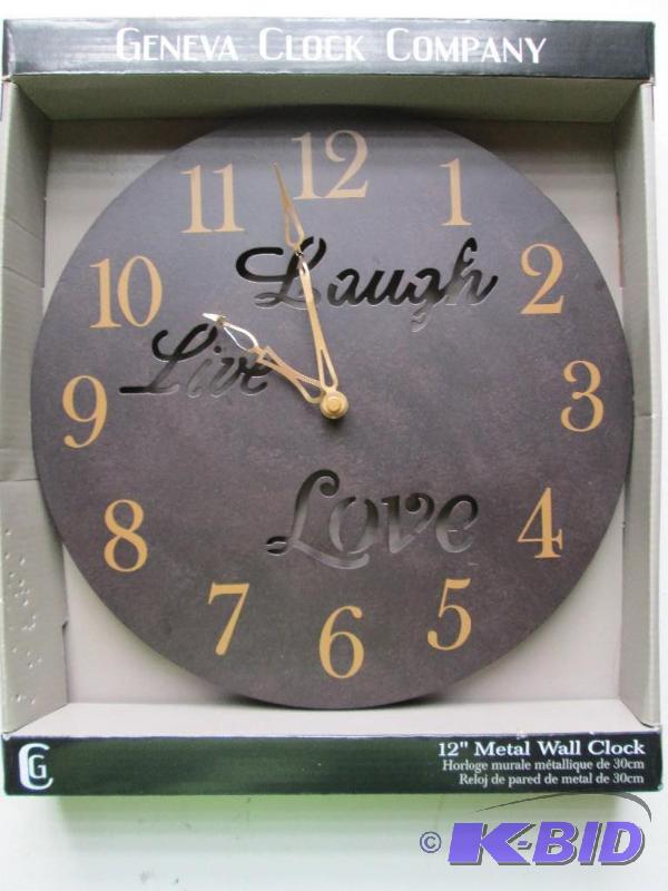 lot 17 image: 12 inch metal wall clock by Geneva Clock Comp...