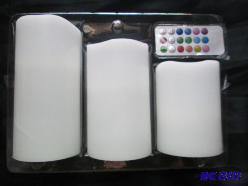 lot 20 image: 3-piece battery operated candle set with remo...