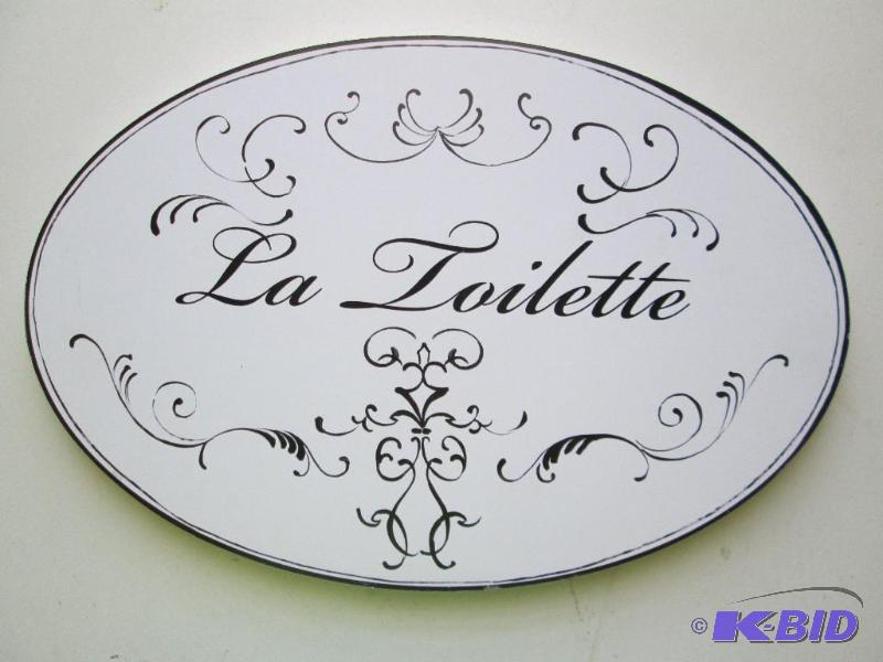 lot 30 image: Wooden wall plaque La Toilette. Measures 10...