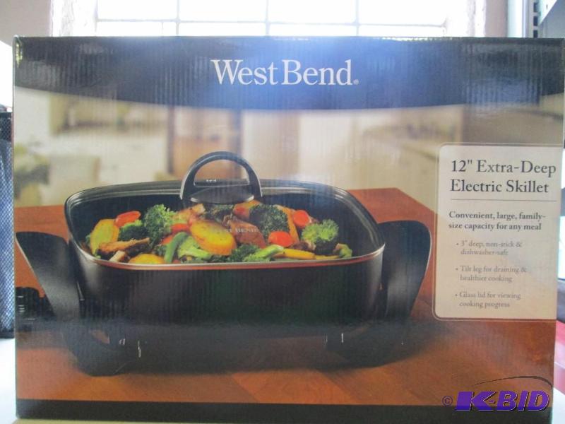 lot 31 image: Westbend 12 inch extra deep electric skillet....