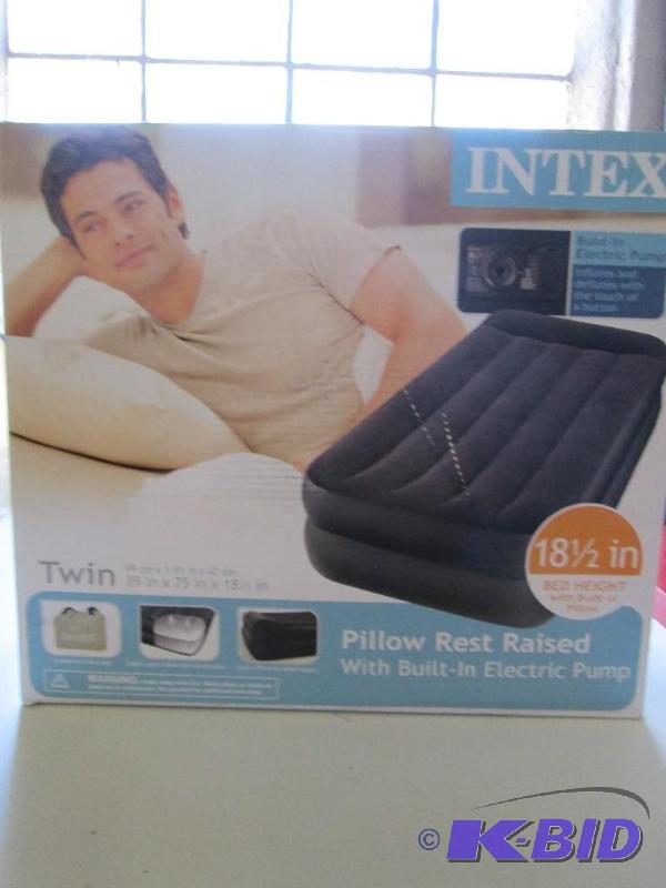 lot 6 image: Intex air mattress. Twin size. Includes mattr...