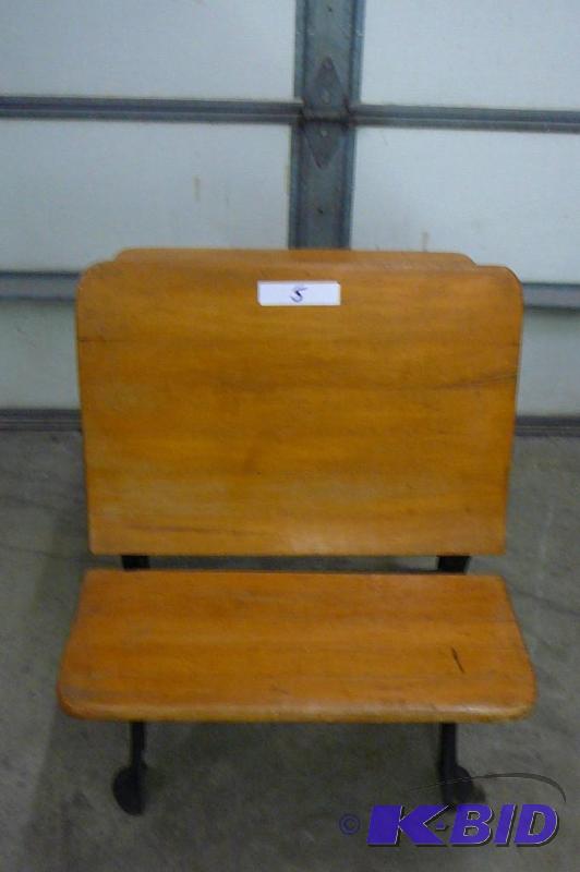 Old fashion wood and cast iron school desk wi...