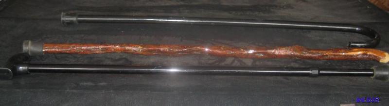 TWO VINTAGE CANES AND ADDITIONAL CANE