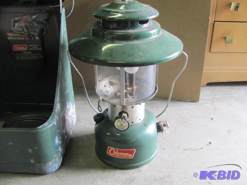 This COLEMAN Lantern with original metal carr...