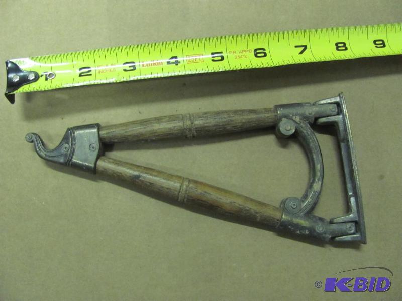 This Vintage Metal and Wood Wall Hook would l...