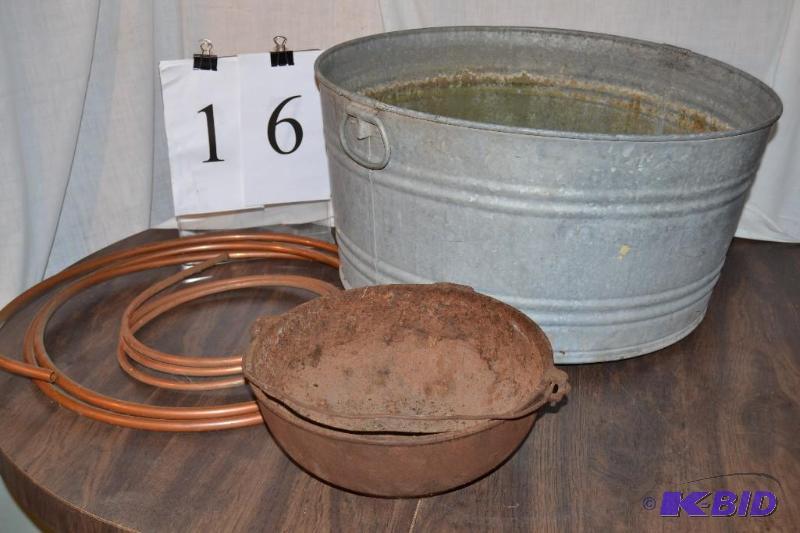lot 16 image: Griswold pot, tub, copper