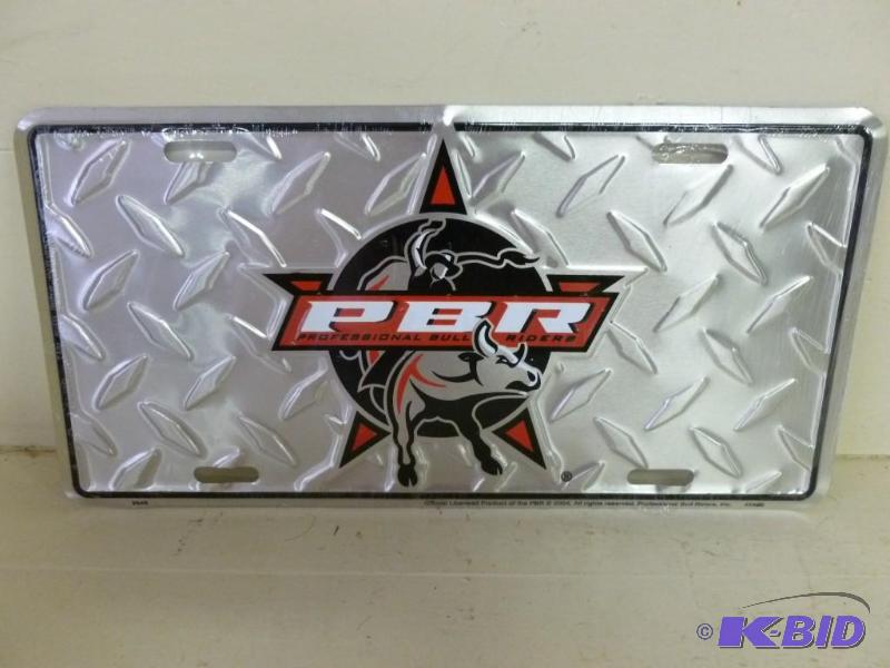 lot 122 image: Professional Bull Riders embossed metal licen...
