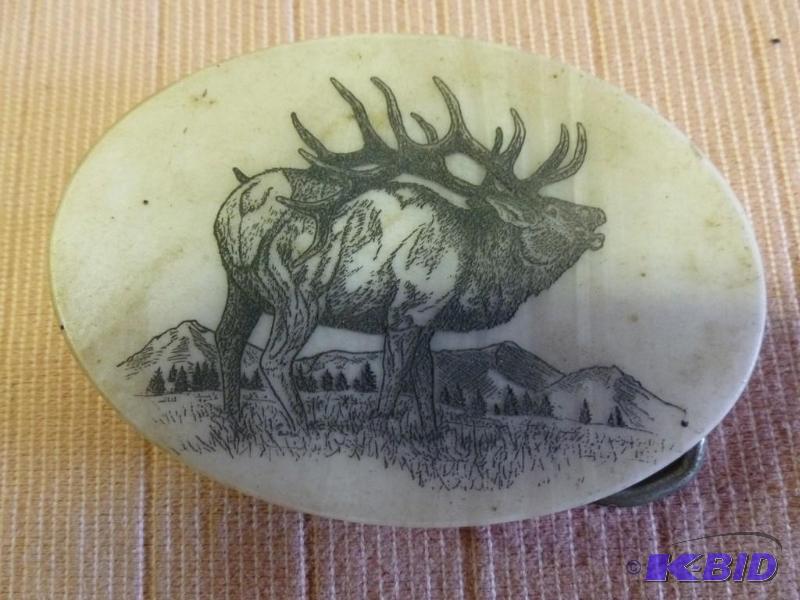 lot 146 image: Elk image on marble stone belt buckle that me...