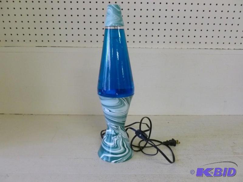 lot 153 image: Large lava lamp that measures 16 14" H,...