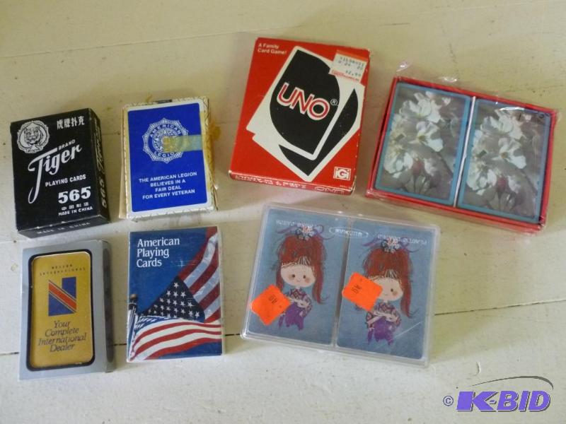 lot 210 image: This lot consists of several decks of playing...