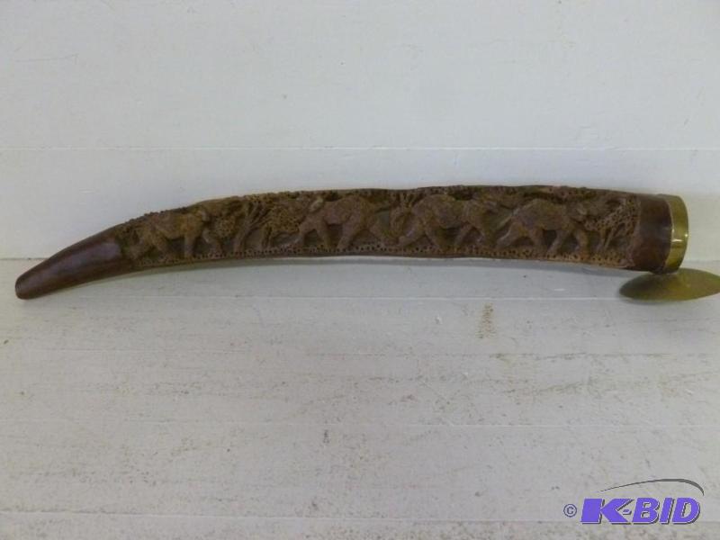 lot 26 image: Large hand carved walnut and brass capped ele...