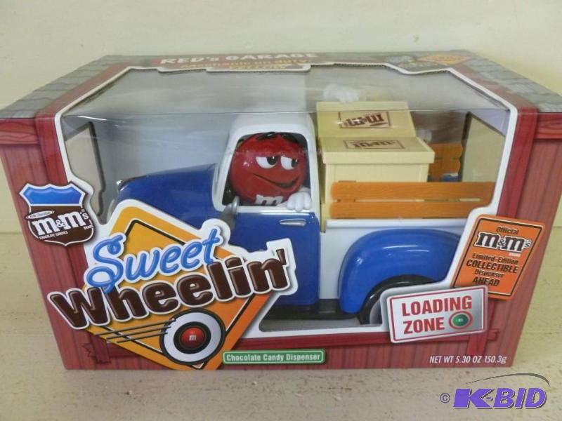 lot 33 image: Collectible M&ampM Sweet Wheelin truck cand...