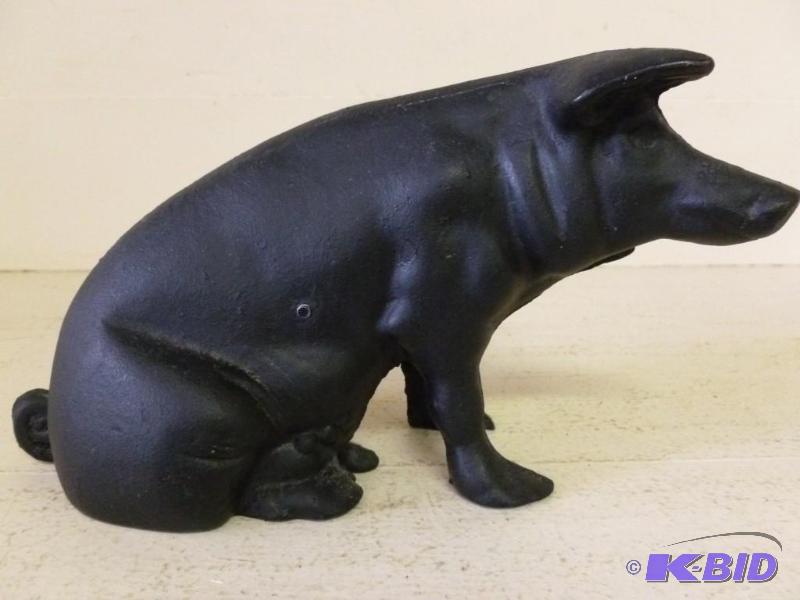 lot 38 image: Large vintage cast iron pig coin bank that me...