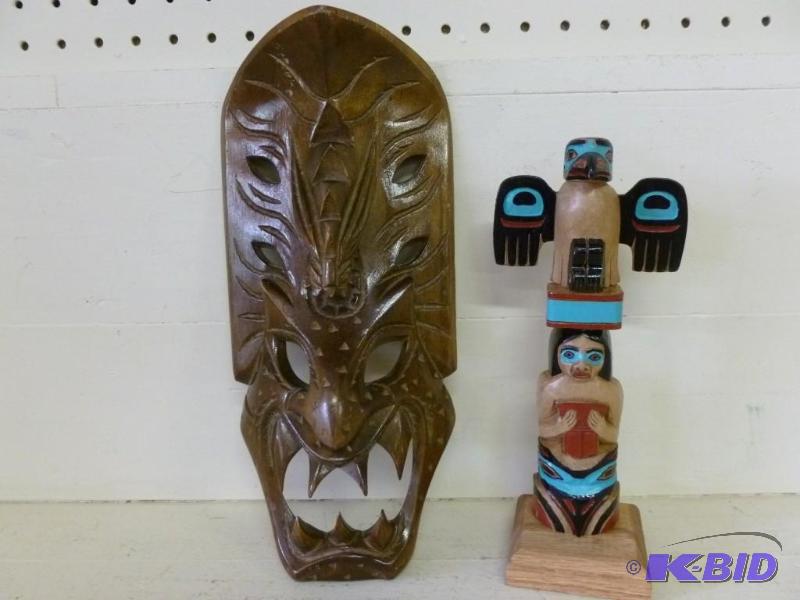lot 44 image: Lot of two hand carved wood art pieces that i...