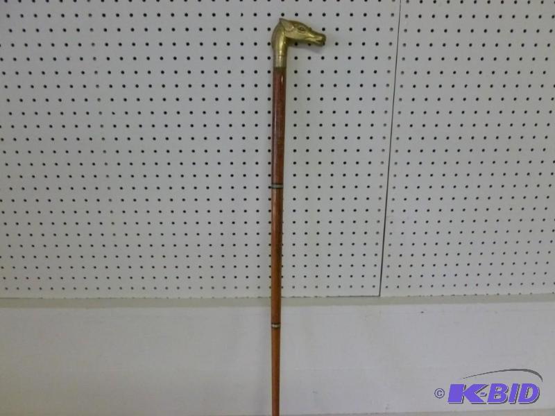 lot 48 image: Vintage cast brass horse head wooden cane tha...