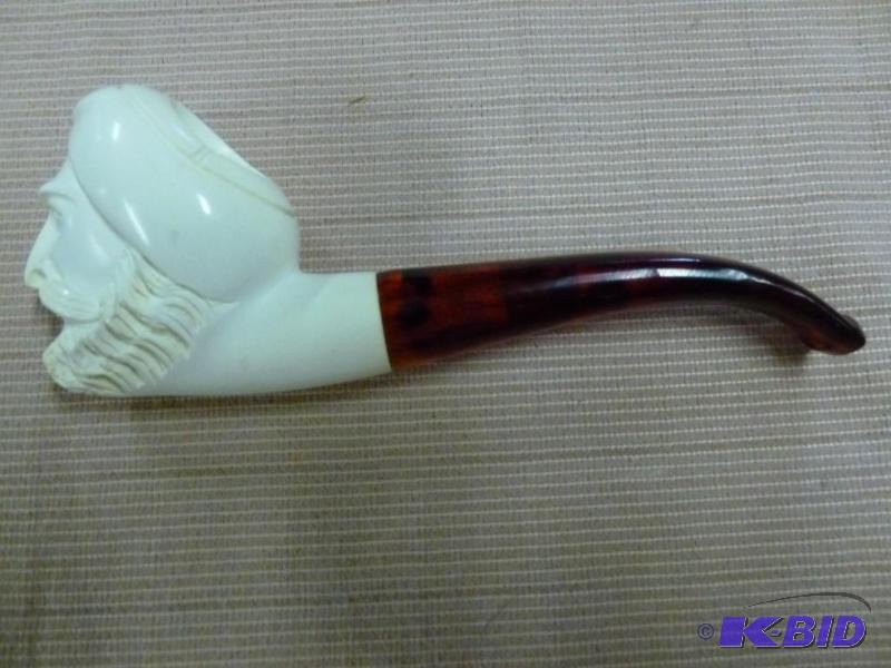 lot 62 image: Decorative smoking pipe that measures 5 14&q...