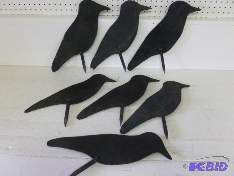 lot 76 image: Lot of seven wooden crow decoys that measure ...